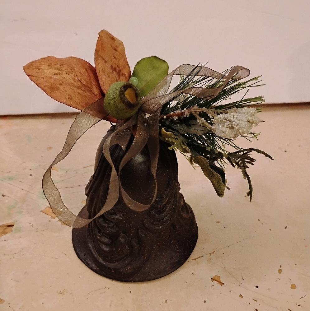 Decorative Brown Bell with Floral And Ribbon Accents